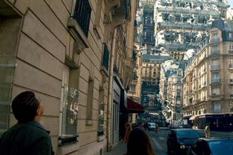 Inception (2010), Paris dream construct screen shot, April 27, 2012. (http://dpmlicious.com). Qualifies as fair use under US Copyright laws because of poor resolution of shot, not intended for distribution.