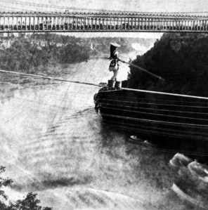 Maria Spelterini crossing Niagara Falls on tightrope with feet in peach baskets, July 4, 1876. (George E. Curtis [1830-1910] via Wikipedia). In public domain.