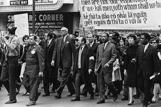 Dr. Martin Luther King and Benjamin Spock leading antiwar protest, Chicago, IL, March 25, 1967. (AP via LA Times).