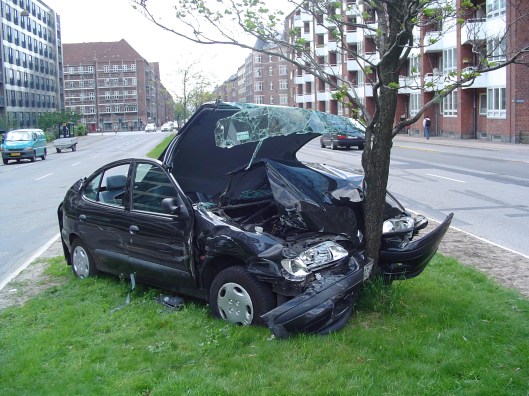 A car wreck on Jagtvej, a road in Copenhagen, Denmark, May 24, 2005. (Thue via Wikipedia). Released to public domain.