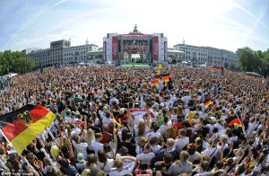 Ready and waiting: 500,000 Germany supporters await the arrival of the country's World Cup stars, Brandenburg Gate in Berlin, July 15, 2014. (AFP/Getty via http://www.dailymail.co.uk/sport/worldcup2014/).