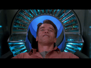 Total Recall (1990) scene where fake memories meet real ones (a.k.a., "memory cap scene"), August 5, 2014. (http://www.rellimzone.com/).