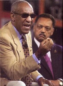 Bill Cosby in midst of his "Pound Cake" speech (with Rev. Jesse Jackson in background), NAACP 50th Anniversary of Brown decision gala, Washington, DC, May 17, 2004. (http://blackpast.com).