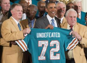 President Barack Obama honors the Super Bowl VII Champions and their 1972 perfect season, East Room, White House, August 20, 2013. (UPI/Kevin Dietsch). Read more: http://www.upi.com/Top_News/US/2013/08/20/Obama-welcomes-72-Dolphins-to-the-White-House/UPI-27321377029133/#ixzz3HopWhqwX