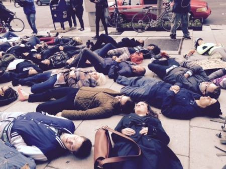 Protestors hold a die-in at 14th and I St NW, Washington, DC, November 25, 2014. (Andrea McCarren/WUSA via http://www.wusa9.com)