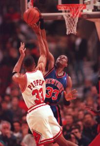 Patrick Ewing blocking a Scottie Pippen shot, United Center, Chicago, March 14, 1996. (http://chicago.cbslocal.com).