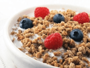 Post Grape-Nuts cereal at its visual best, with milk, raspberries and blueberries, May 6, 2015. (http://plantbasednutritionlifestyle.com/).