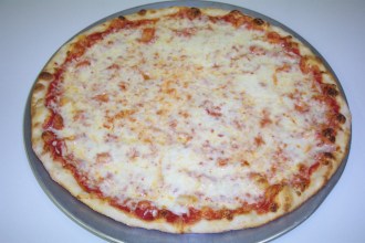 A cheese pizza similar to the one used on that '86 Pitt brochure (only a LOT less orange), April 12, 2016. (http://student.plattsburgh.edu).